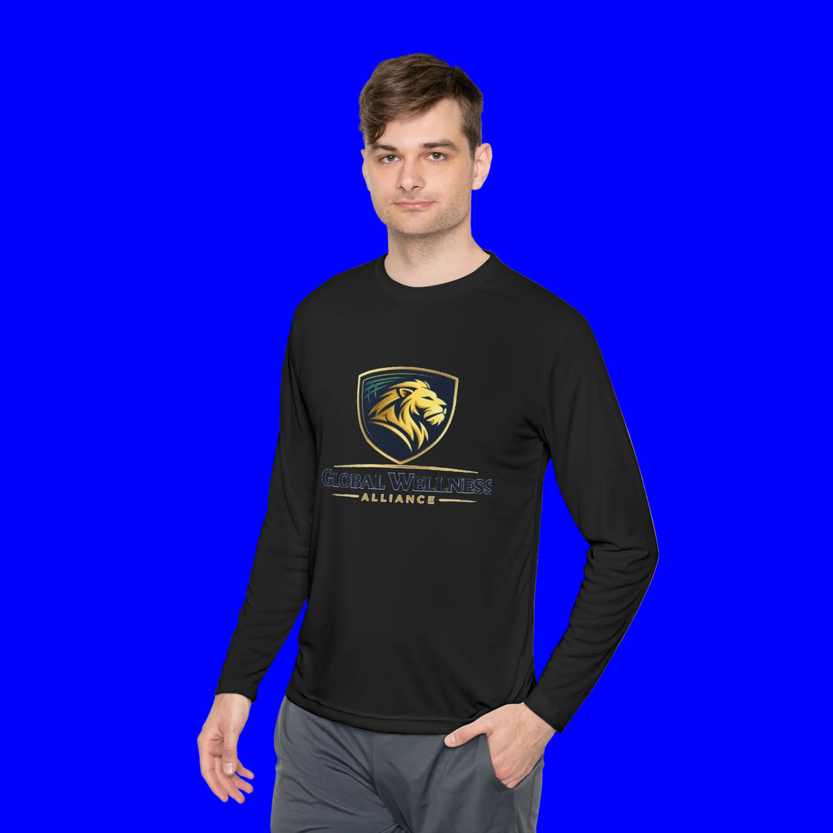Man wearing a moisture-wicking long sleeve tee with a lion logo for Alliance Global Wellness.