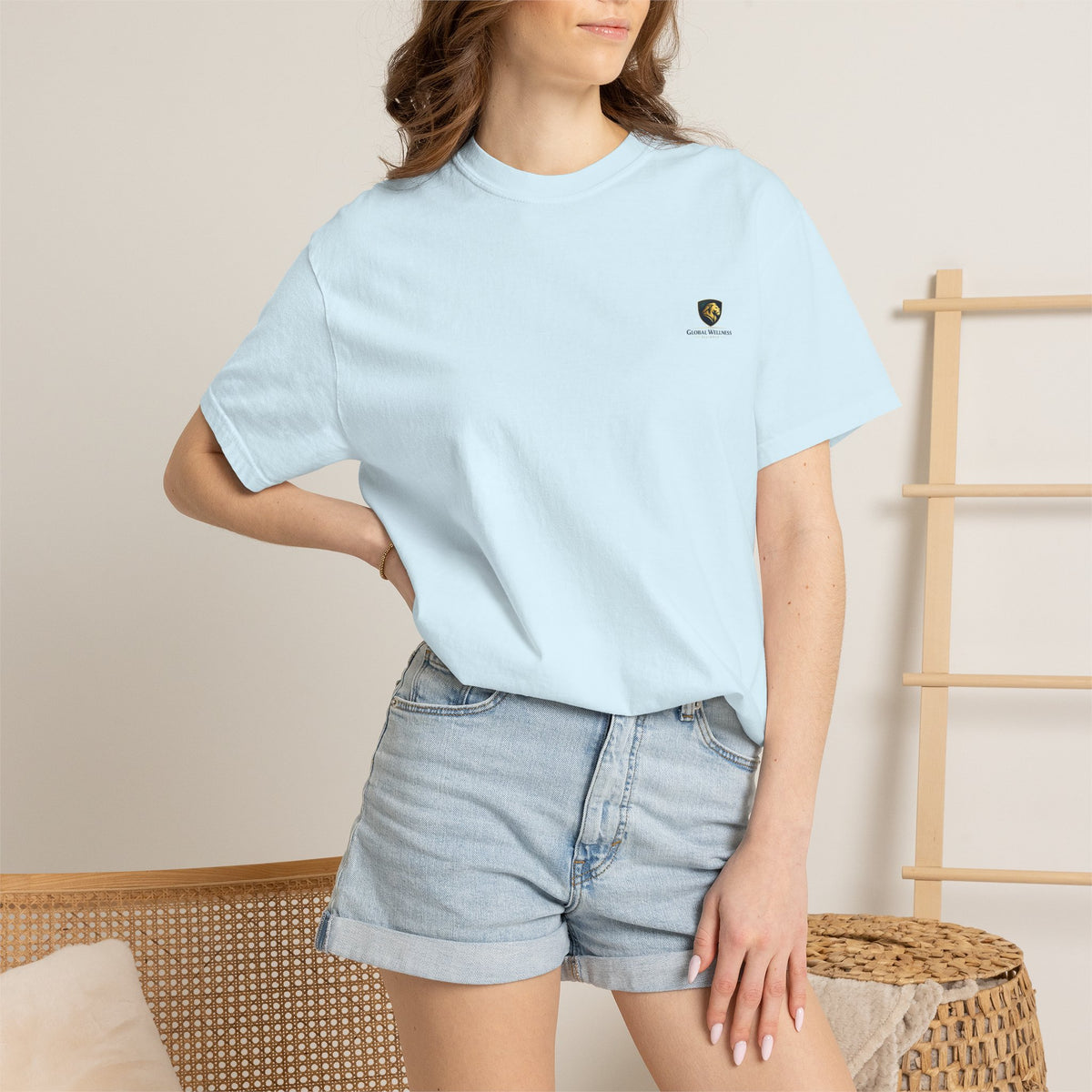 Minimal Cream T‑Shirt with Small Shield Logo — Casual Everyday Tee