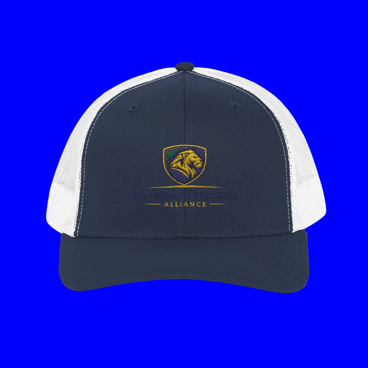 Embroidered trucker cap featuring a lion design and alliance logo on a navy blue and white background.