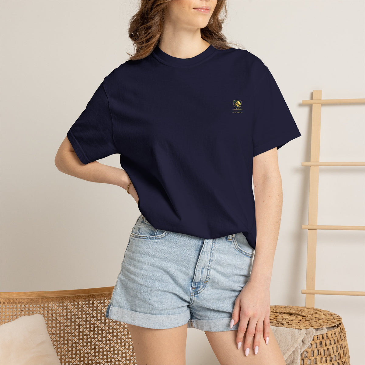 Minimal Cream T‑Shirt with Small Shield Logo — Casual Everyday Tee