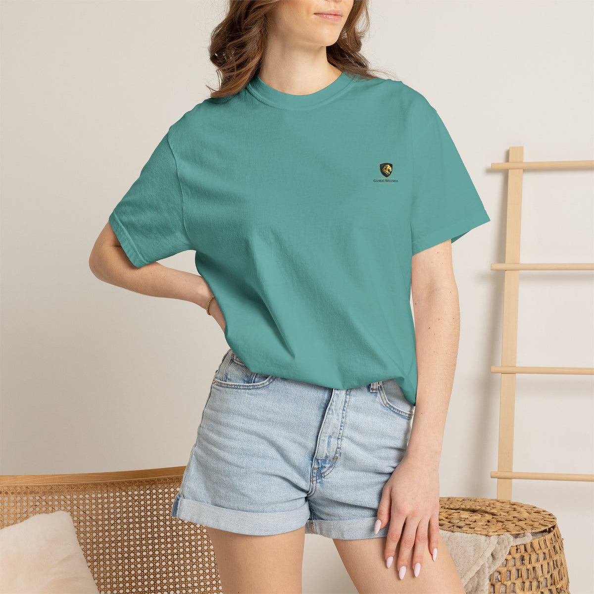 Minimal Cream T‑Shirt with Small Shield Logo — Casual Everyday Tee