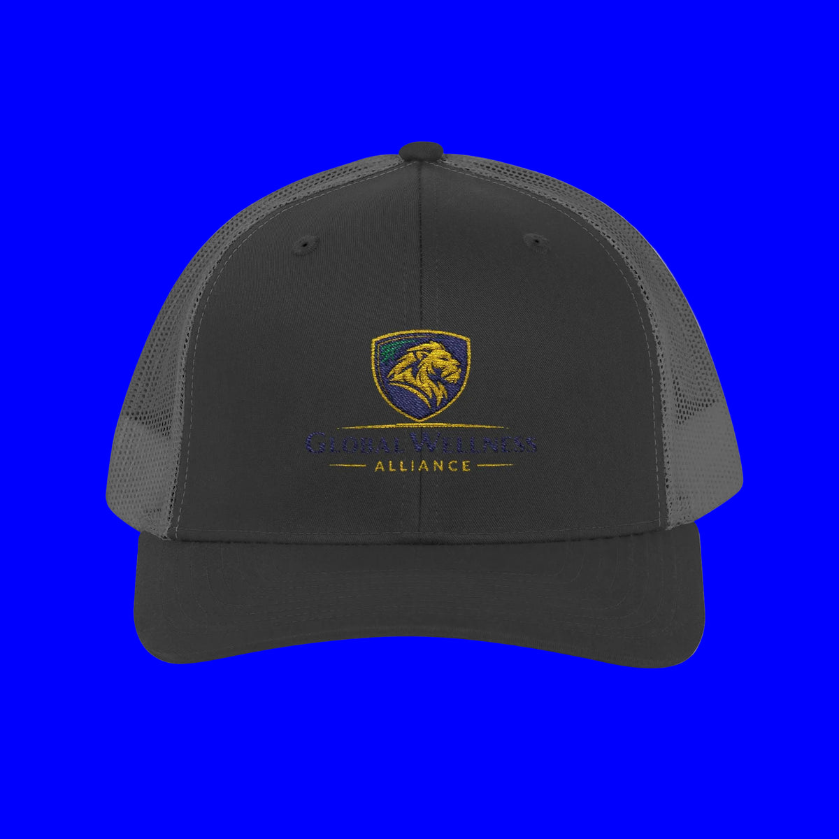 Embroidered trucker cap featuring Global Awareness Shield logo in gray and orange color scheme.