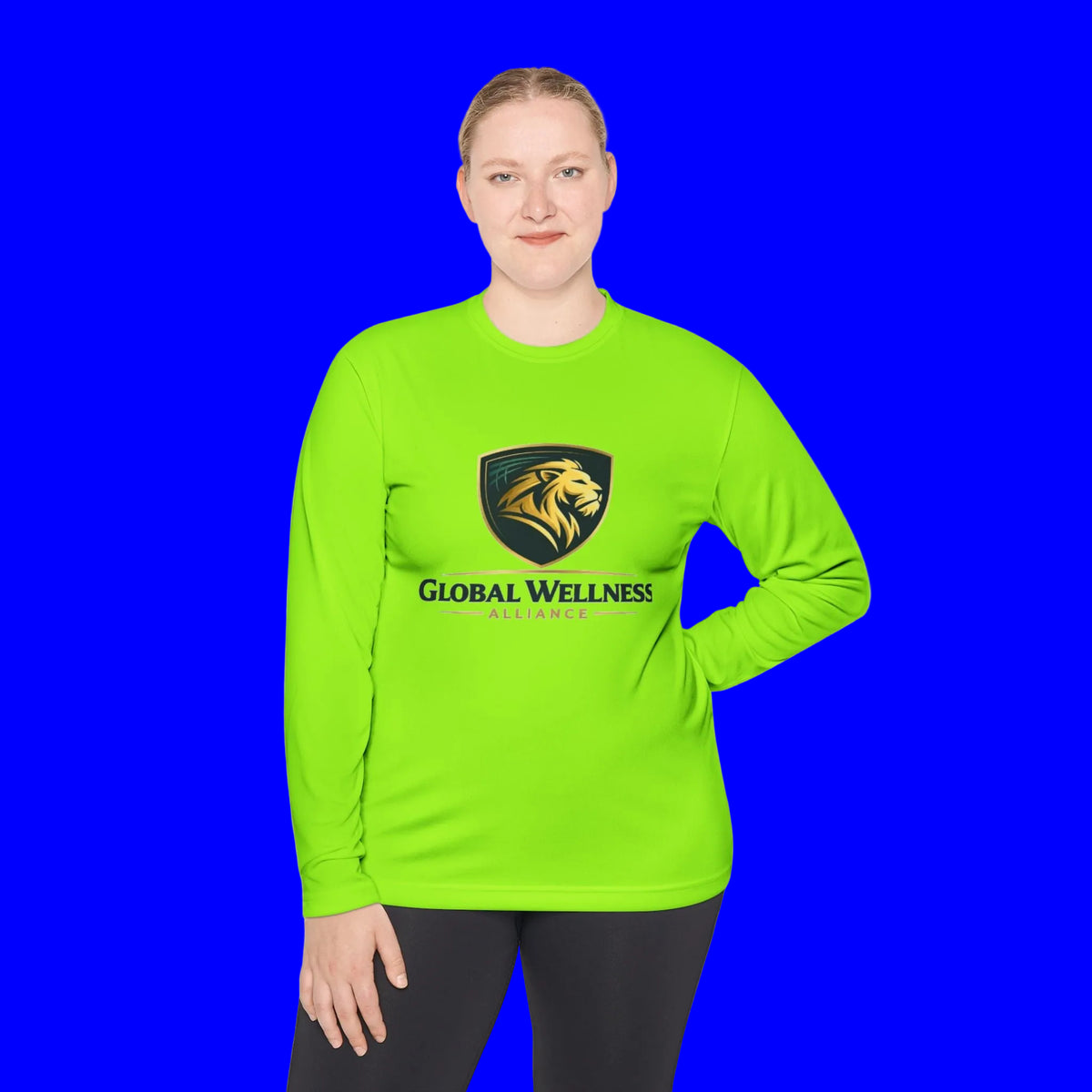 Model wearing a bright green moisture-wicking long sleeve tee featuring Global Wellness Alliance logo.