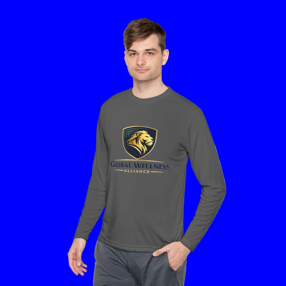 Man wearing a moisture-wicking long sleeve tee with Global Wellness Alliance logo on a blue background.